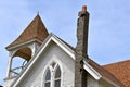 Crumbling chimney on an old white country church Royalty Free Stock Photo