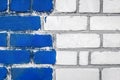 Old white dirty brick art wall design texture with blue paint background Royalty Free Stock Photo