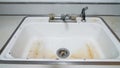 Old white dirty kitchen sink cloce up Royalty Free Stock Photo