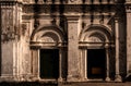 Old white  door and building   background texture Royalty Free Stock Photo