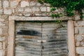 Old white doors. Wood texture. Old shabby paint Royalty Free Stock Photo