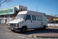 Old white Fiat Ducato van parked on the street.