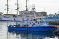 Old sailing ship and a small navigation vessel in Gdynia harbor, Poland Royalty Free Stock Photo