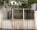 Old white gate leading to a village garden Royalty Free Stock Photo