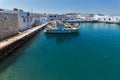 Old white house and Bay in Naoussa town, Paros island, Cyclades, Greece Royalty Free Stock Photo