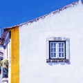 Old white house and window(Portugal) Royalty Free Stock Photo