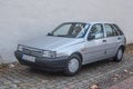 Old compact car Fiat Tipo 1.4 parked