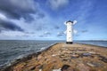 An old white lighthouse in Swinoujscie, Poland.