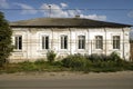 Old white living house, typical dwelling of a small Russian city in Mikhaylov of Ryazan region, Russia.