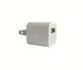 Old white mobile adapter charger and USB port plug on white background Royalty Free Stock Photo