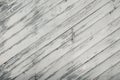 Old white painted wooden wall with diagonal strips Royalty Free Stock Photo