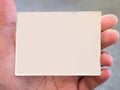 Old white picture frame background on a man hand. Royalty Free Stock Photo