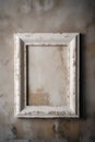 old white picture frame on grunge concrete wall, can be used as background Royalty Free Stock Photo