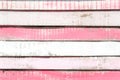 Old white and pink painted vintage wooden texture and background