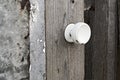 Old white round door handle Royalty Free Stock Photo