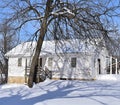 Old white school house o a winter day