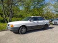 Old white sedan car Audi 80 left side parked Royalty Free Stock Photo