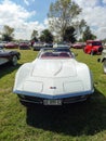 Old white sport Chevrolet Corvette C3 Stingray two door convertible circa 1970. Classic muscle car