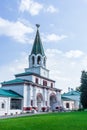 Old white stone bell tower on a sunny day