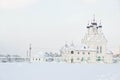 Old white stone church in winter day Royalty Free Stock Photo