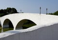 Old white stone footbridge Royalty Free Stock Photo