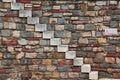 Old White Stone Stairs and multicolored Stonework Wall