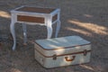 Old white suitcase on grass . Royalty Free Stock Photo