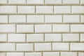 Old white tile brick wall background texture Royalty Free Stock Photo