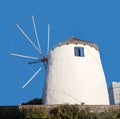 Old white traditional windmill close up in Chora on Ios Island, Cyclades, Greece Royalty Free Stock Photo