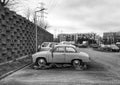 Old small white vintage car Syrena 105L parked.