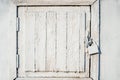 Old white wooden door with a padlock, background Royalty Free Stock Photo