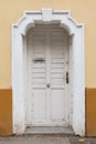 Front view of a old rustic white front door, Zagreb Royalty Free Stock Photo