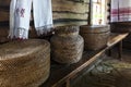 Old wicker basket on the bench in the a village house for print