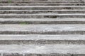 Old, wide and weathered gray concrete stairs structure. Stairway composition, texture, background. Royalty Free Stock Photo