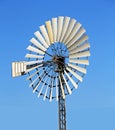 Old Windmill on a pylon with a lot of wings Royalty Free Stock Photo