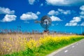 Old windmill along a countryside road, The Netherlands Royalty Free Stock Photo
