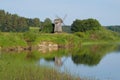 Old windmill on the bank of the river Sorot. Mikhailovskoe, Pushkin Mountains Royalty Free Stock Photo