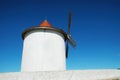 Old windmill in Capo Grosso, Corsica. Royalty Free Stock Photo