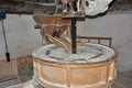 An old windmill grinding wheat
