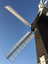 Old windmill in Kent - Black with white sails Royalty Free Stock Photo