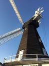 Old windmill in Kent - Black with white sails Royalty Free Stock Photo