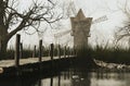 Old windmill by the lake