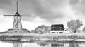 Old windmill landscape canal mill clouds