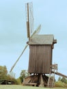 Old windmill made of wood in the field