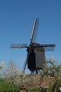 Old windmill in Netherlands, spring season Royalty Free Stock Photo