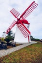 Old windmill Red Peak Mill in Bretanha (Sao Miguel, Azores). Traditional white wind mill with red roof and wings in village Royalty Free Stock Photo