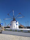 Old windmill after restoration, works for a bakery, Portugal