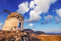 Old windmill ruins on a hill in Santorini island