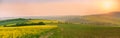 Old windmill at sunset. Spring landscape. Moravia fields panorama Royalty Free Stock Photo