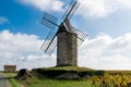 Old windmill in a vineyard near Saint-Emilion in Medoc region ne Royalty Free Stock Photo